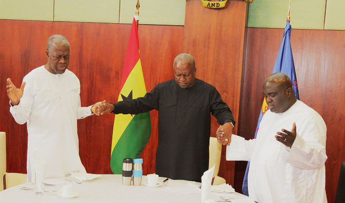 President John Mahama joins hands with Vice-President Kwesi Amissah-Arthur (left) and Mr Julius Debrah (right), the Chief of Staff, in prayer Clergy, Prez Mahama pray for nation at Flagstaff House